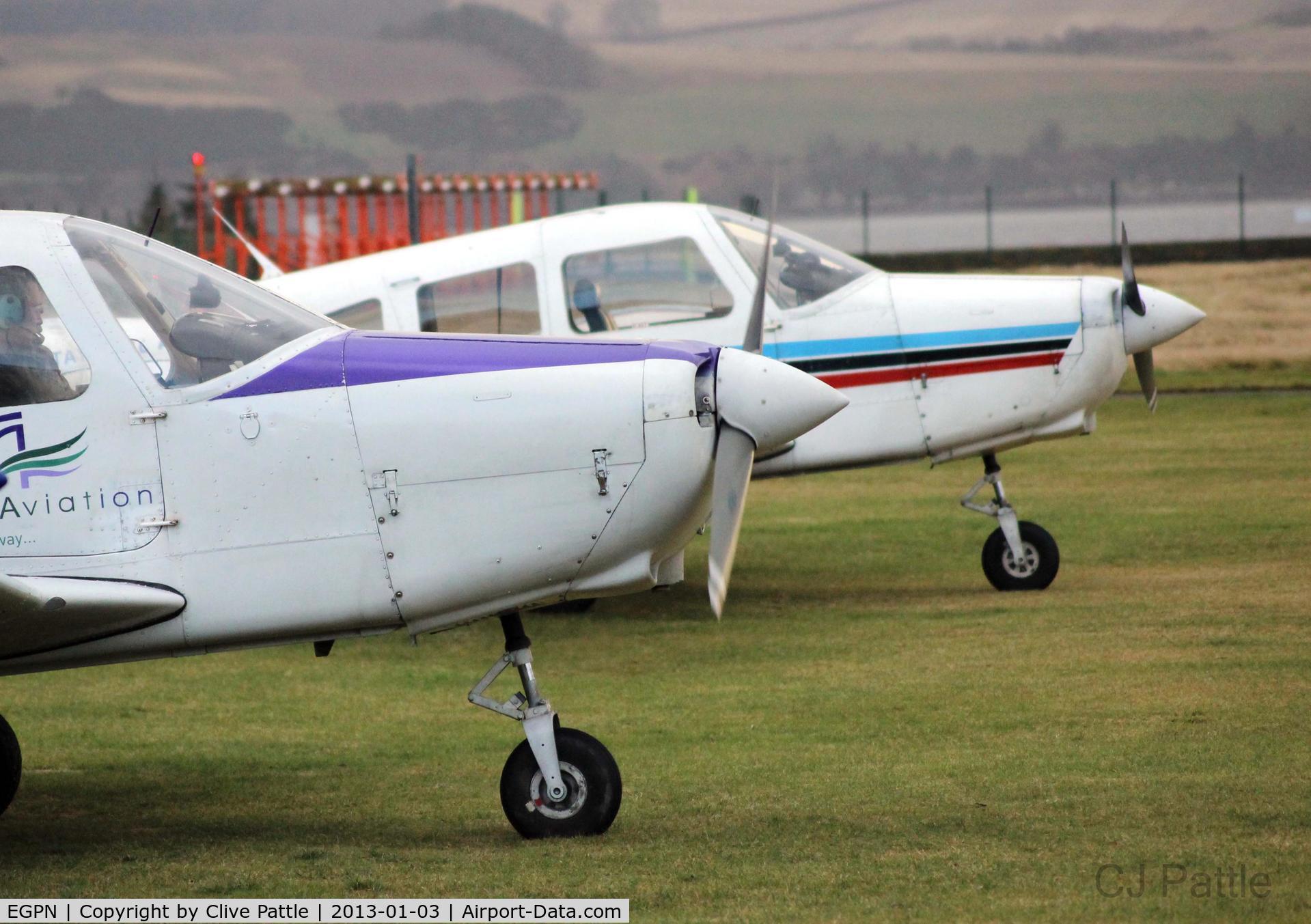 Dundee Airport, Dundee, Scotland United Kingdom (EGPN) - Tayside Aviation Cherokee close-up at Dundee