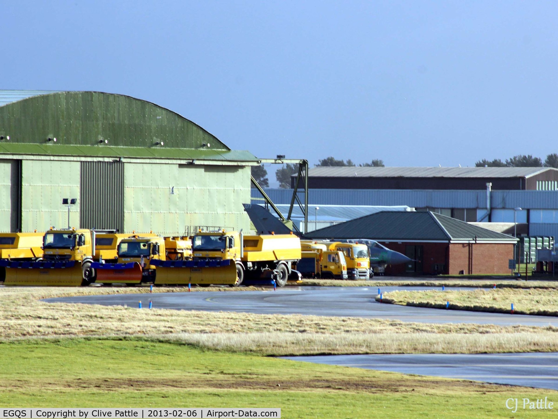 RAF Lossiemouth Airport, Lossiemouth, Scotland United Kingdom (EGQS) - Hangars on east side of airfield close to Rwy 23 threshold - note Tornado GR.4 in amongst stored snow ploughs