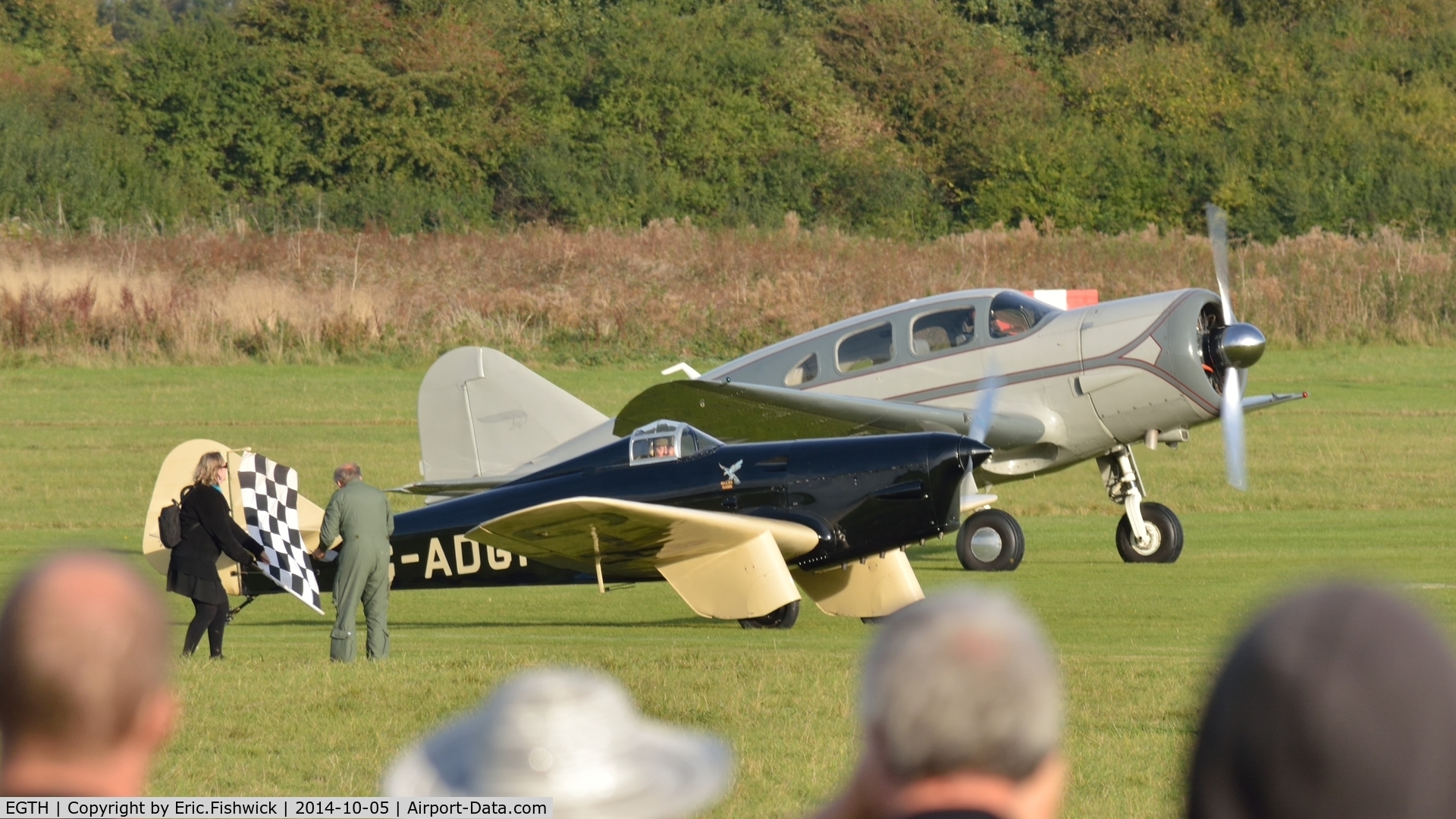 EGTH Airport - The Flag drops for the two fastest aeroplanes at the start line of the Shuttleworth Mock Handicap Air Race, Oct. 2014.