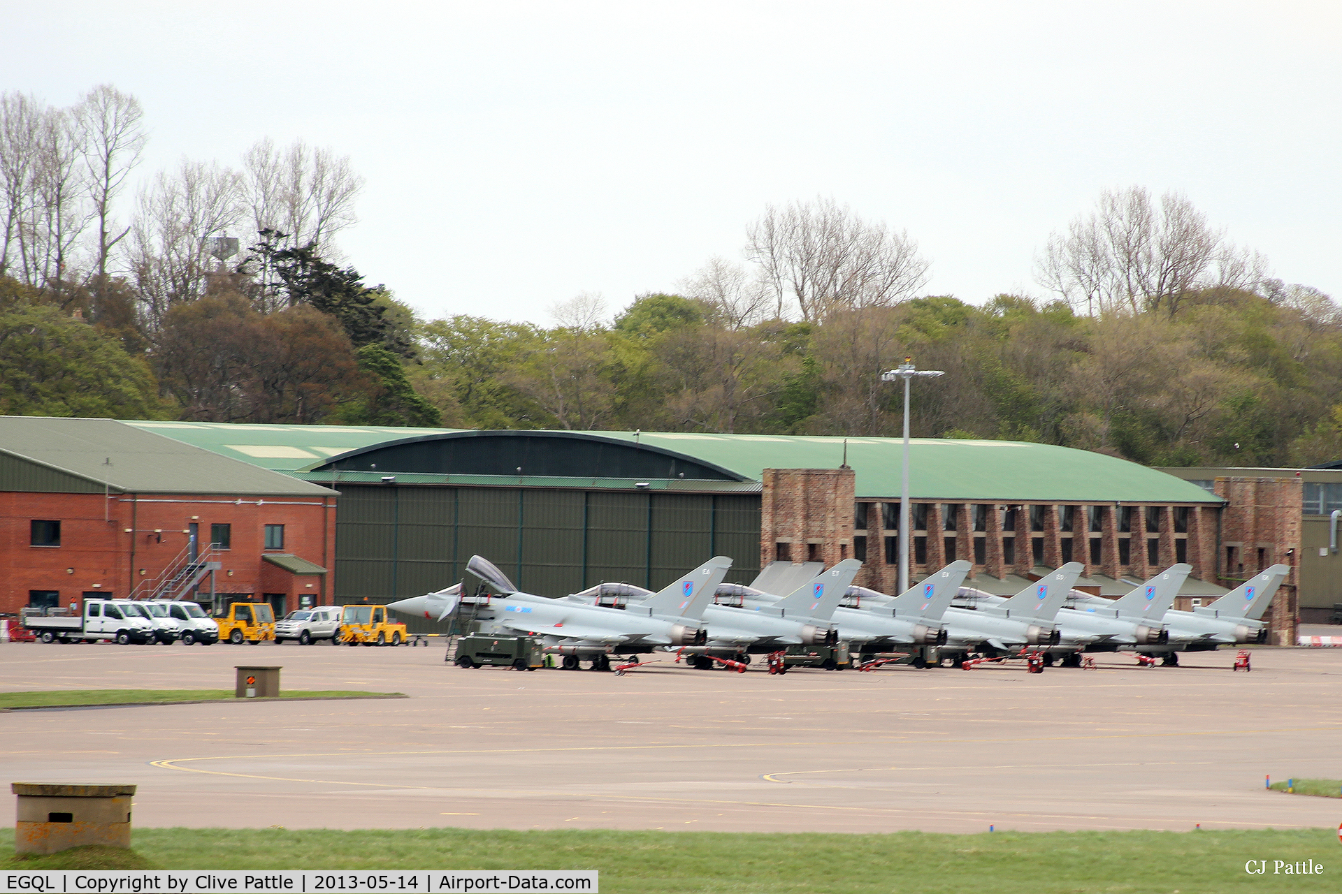 RAF Leuchars Airport, Leuchars, Scotland United Kingdom (EGQL) - A line-up of some of the resident Typhoons of 6 Sqn on the apron at RAF Leuchars. They are, from L-R FGR.4's ZK302/coded EA, ZK318/ET, ZK320/EV, ZK314/EO, ZK324/EI and T.3 ZK381/EX. The Sqn has now moved north to RAF Lossiemouth EGQS.