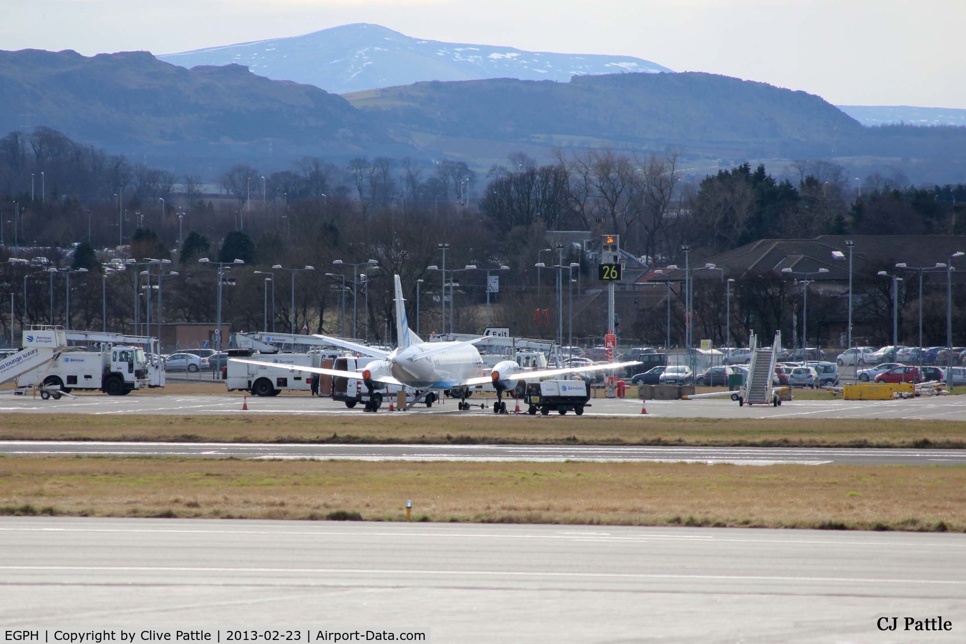 Edinburgh Airport, Edinburgh, Scotland United Kingdom (EGPH) - A busy apron scene, cluttered with airfield vehicles at EGPH