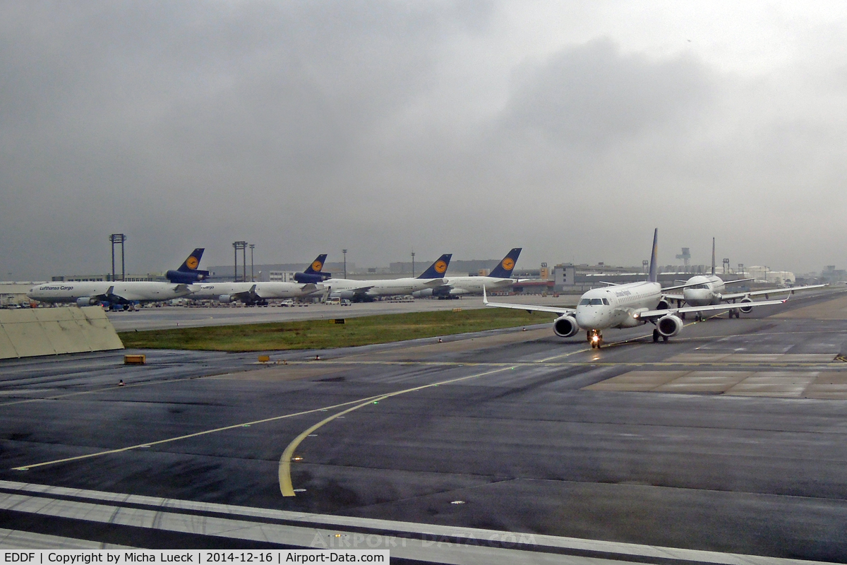 Frankfurt International Airport, Frankfurt am Main Germany (EDDF) - A look back at LH's base while we are lining up on runway 