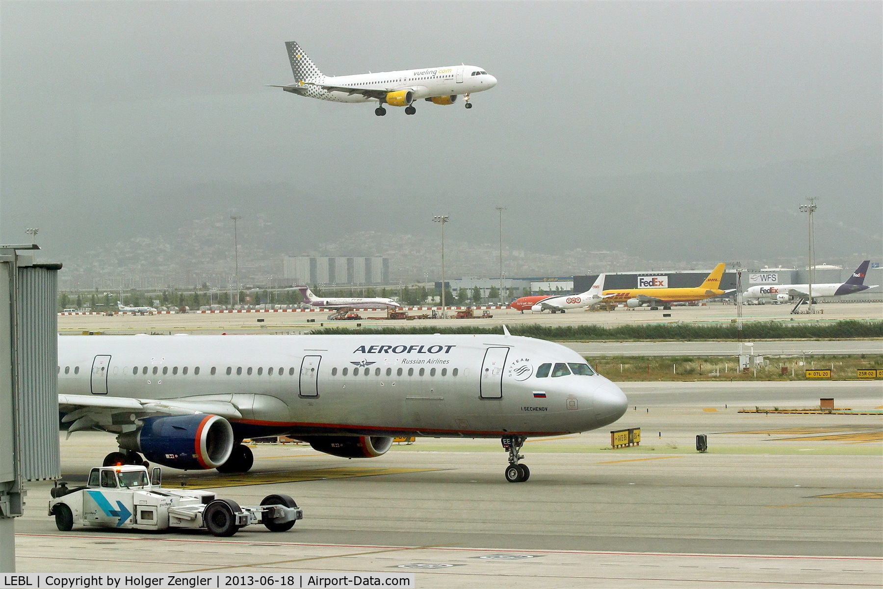 Barcelona International Airport, Barcelona Spain (LEBL) - View thru terminal window to northern runway.....