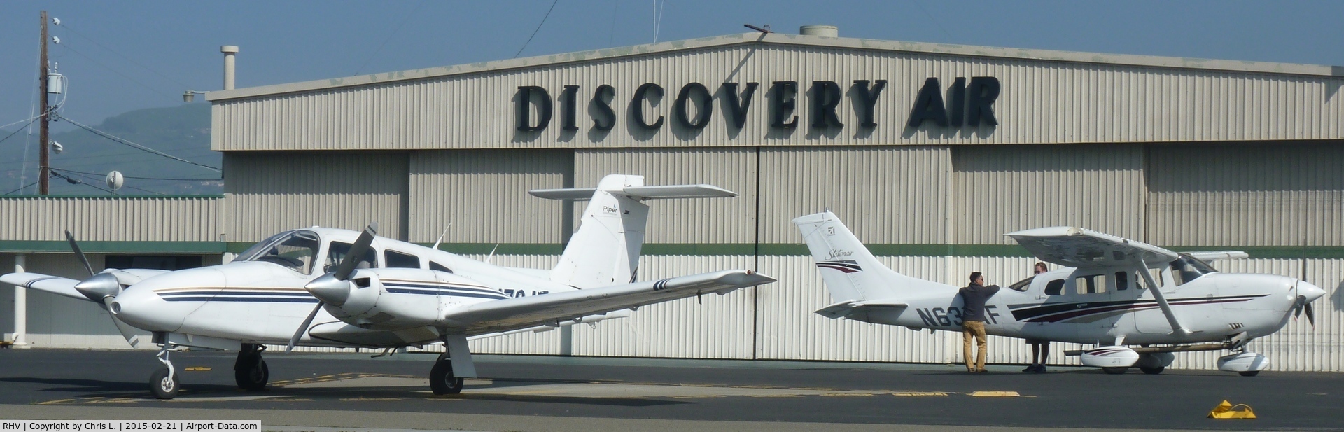 Reid-hillview Of Santa Clara County Airport (RHV) - The Discovery Air hangar with one of Nice Air's Piper Seneca's and Discovery Air's Cessna 206s.