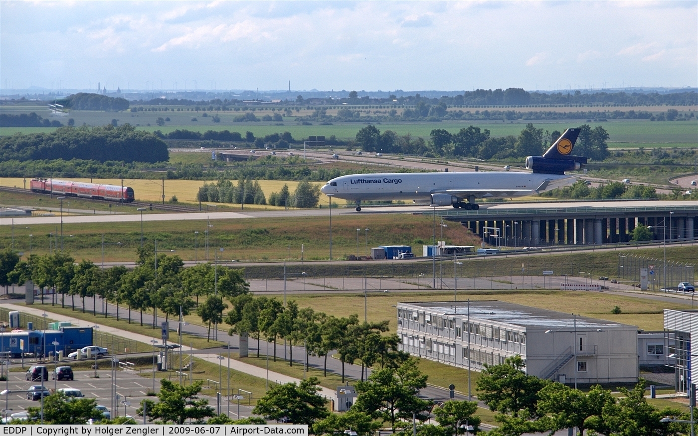 Leipzig/Halle Airport, Leipzig/Halle Germany (EDDP) - Western view from visitor´s terrace to inbound traffic on Autobahn rolling bridge....
