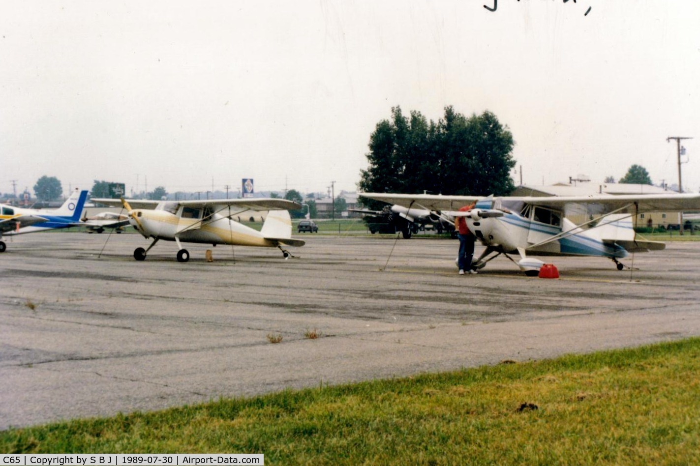 Plymouth Municipal Airport (C65) - The Plymouth ramp with view to the west.