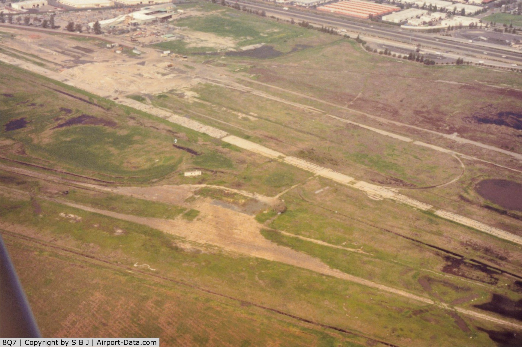 8Q7 Airport - Sky Sailing Fremont,Ca. after closure.Was the last non tower airport in the immediate SF Bay Area.The parallel strip was WWII Heath Field later Baylands Raceway,a very busy drag strip which closed just befor SS did.