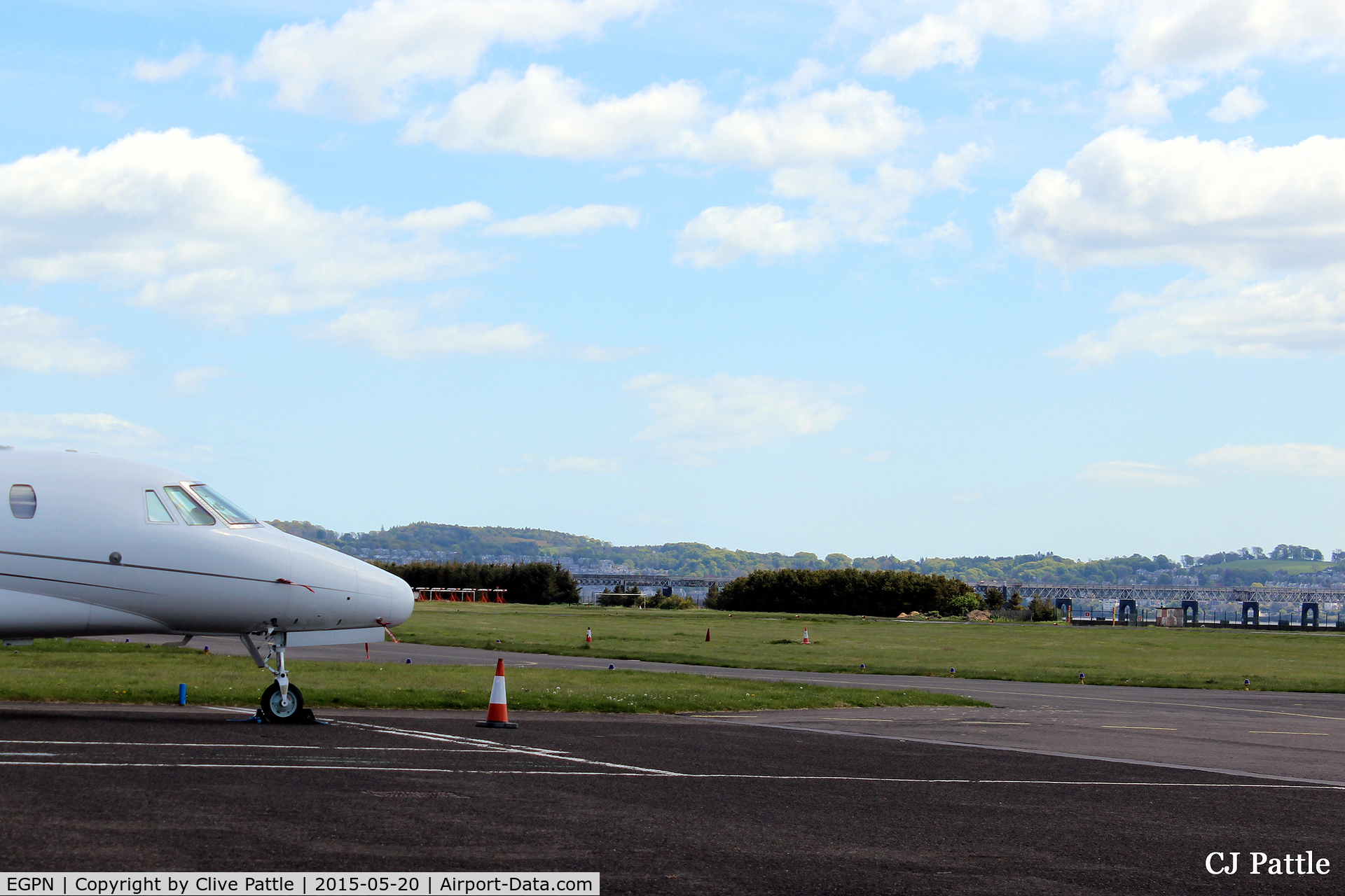 Dundee Airport, Dundee, Scotland United Kingdom (EGPN) - A shot looking southeast across the airfield at Dundee Riverside airport (EGPN). Located on the north bank of the River Tay, the Tay Rail Bridge is visible in the background.
