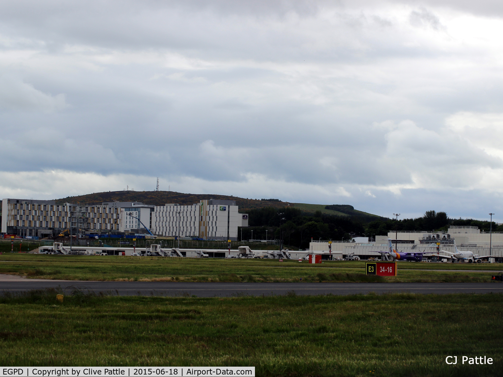 Aberdeen Airport, Aberdeen, Scotland United Kingdom (EGPD) - New Hotels and Industrial units now fill the horizon on the west side of Aberdeen, Scotland EGPD. Must check out the rooms for spotting opportunities.