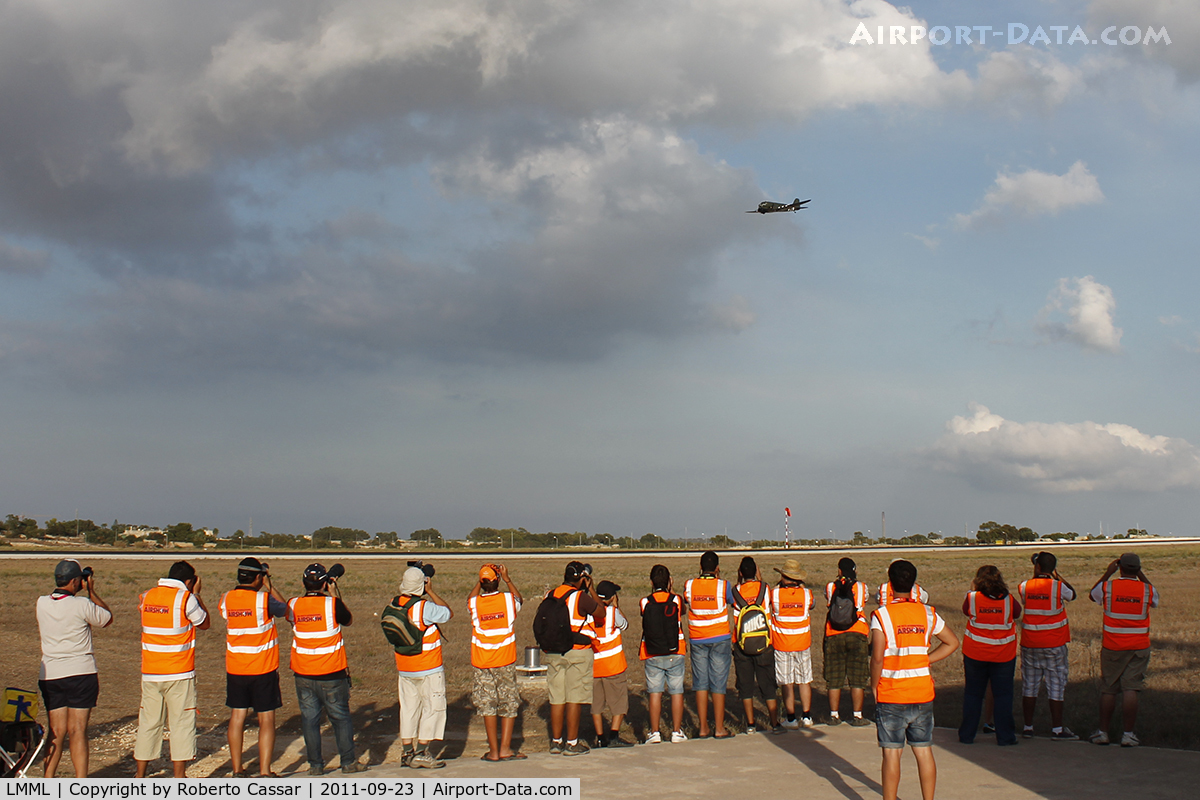Malta International Airport (Luqa Airport), Luqa Malta (LMML) - Volunteers for the Malta International Airshow 2011 are treated to a day at the approach of the active runway to shoot the participants upon landing
