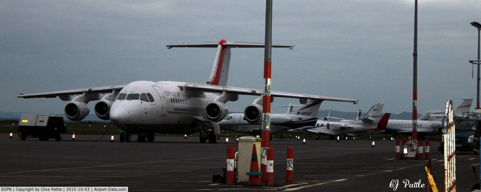 Dundee Airport, Dundee, Scotland United Kingdom (EGPN) - A bizjet busy weekend at Dundee Riverside EGPN - the main apron during the Dunhill Golf Championships at nearby St Andrews. Chartered BAe 146  is Cityjet EI-RJY