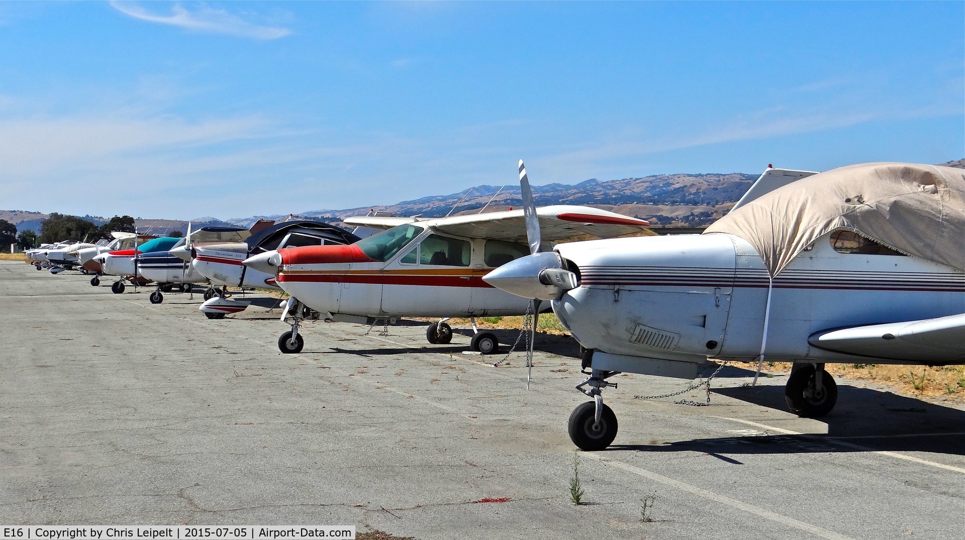 South County Arpt Of Santa Clara County Airport (E16) - Long line of locally-based single engine pistons at South County Airport, San Martin, CA. Most of these aircraft are non airworthiness.