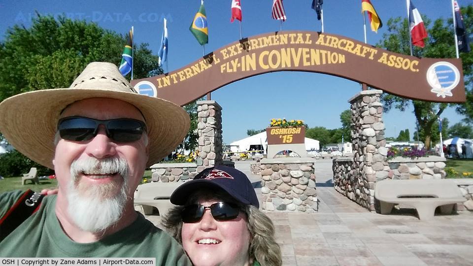 Wittman Regional Airport (OSH) - For my 20,000th photo here on Airport-Data.com, a photo of me and my wonderful wife Dawn at our first trip to the greatness of EAA AirVenture 2015. Wow!