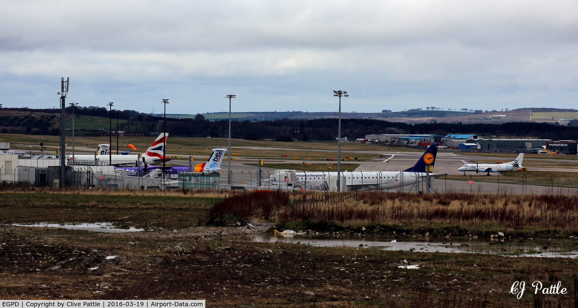 Aberdeen Airport, Aberdeen, Scotland United Kingdom (EGPD) - Terminal view facing north at Aberdeen EGPD. Viewed from a litter strewn area under development.