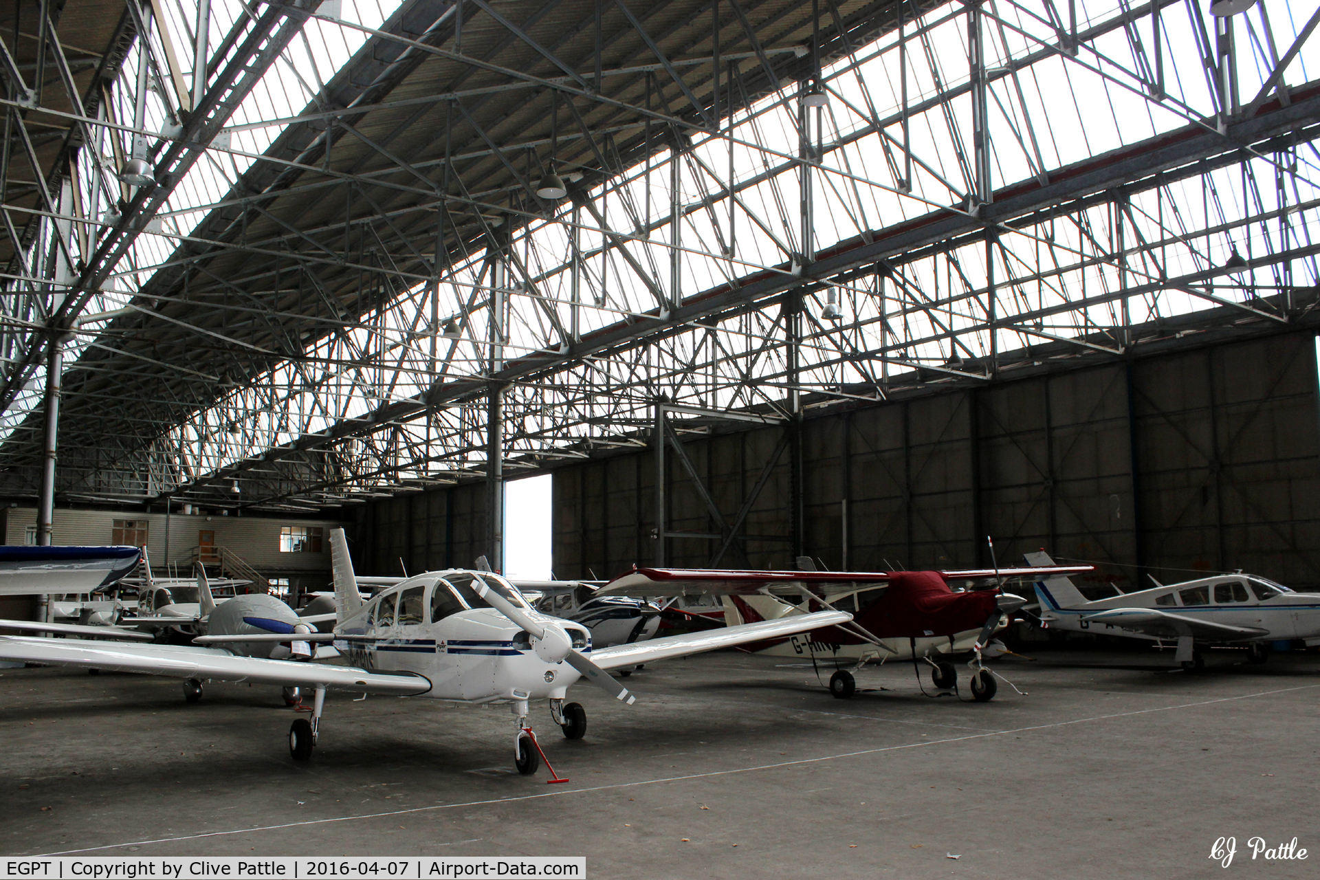 Perth Airport (Scotland), Perth, Scotland United Kingdom (EGPT) - General internal hangar view at Perth EGPT, highlighting the 1938 WWII roof construction, maximising on light.