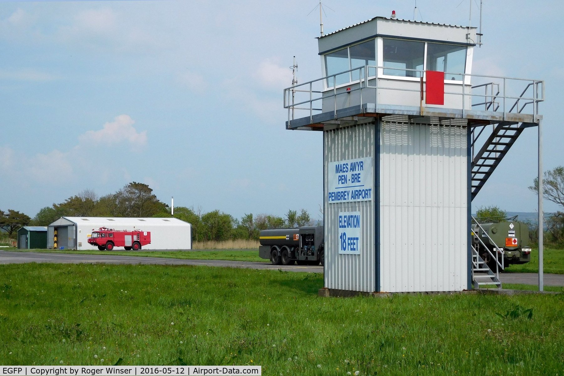 Pembrey Airport, Pembrey, Wales United Kingdom (EGFP) - Fire and Rescue tender No.2, aviation fuel tankers and Control Tower.