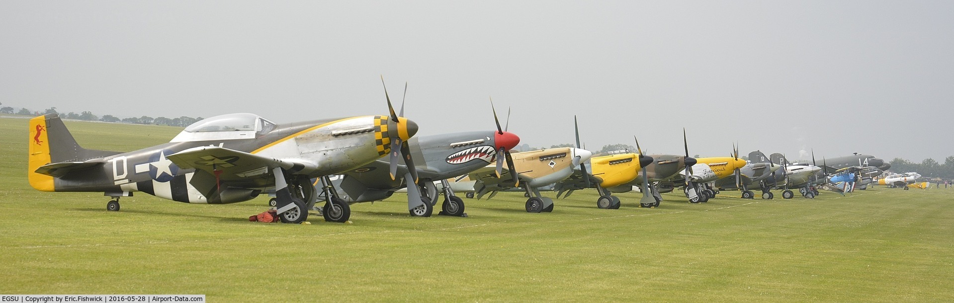 Duxford Airport, Cambridge, England United Kingdom (EGSU) - Part of the Flightline emerging from the morning mist at the IWM American Airshow, May 2016.
