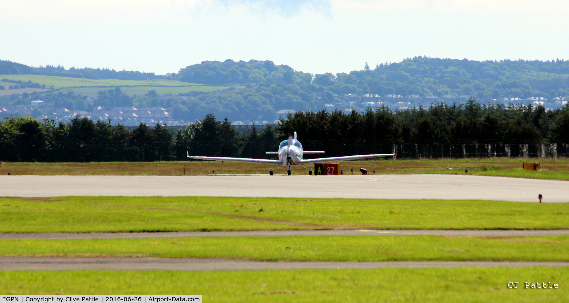 Dundee Airport, Dundee, Scotland United Kingdom (EGPN) - Facing east at Dundee with one of the new Aquila training aircraft of Tayside Aviation carrying pre-flight checks.