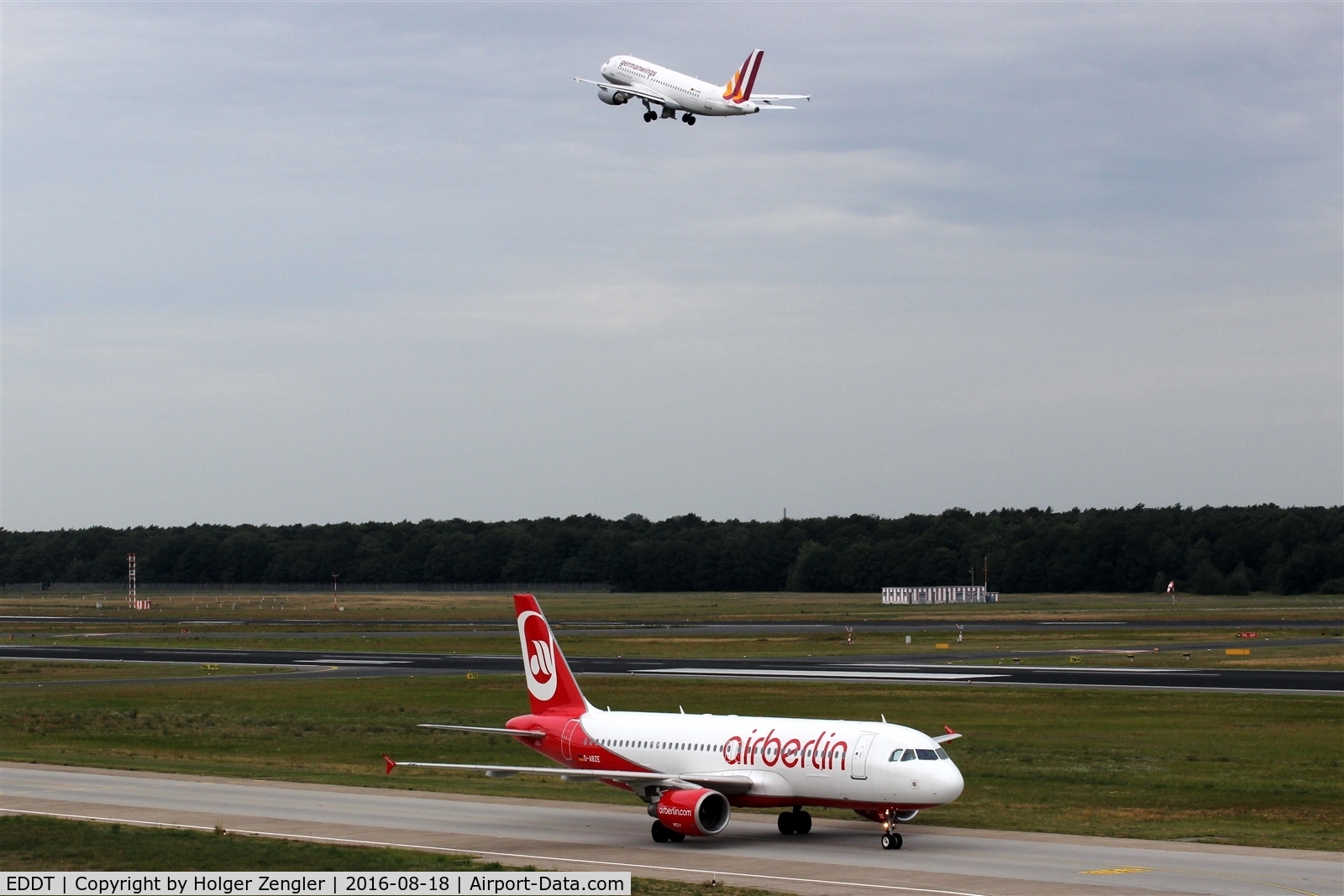 Tegel International Airport (closing in 2011), Berlin Germany (EDDT) - Coming and going unter a grey sky....