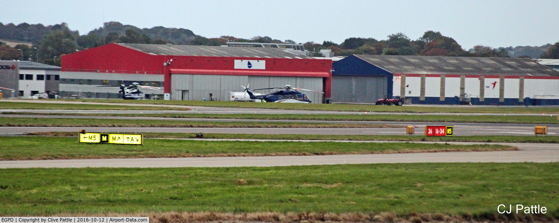 Aberdeen Airport, Aberdeen, Scotland United Kingdom (EGPD) - The Bond Helicopters hangar at ABZ has now lost its titles and now displays the 'Babcock MCS' signs
