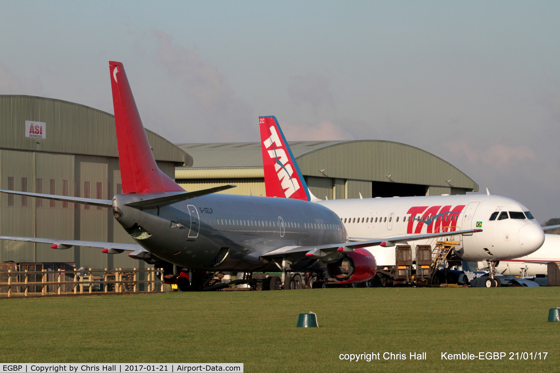 Kemble Airport, Kemble, England United Kingdom (EGBP) - Jet2 B737 and TAM A319 being parted out by ASI at Kemble