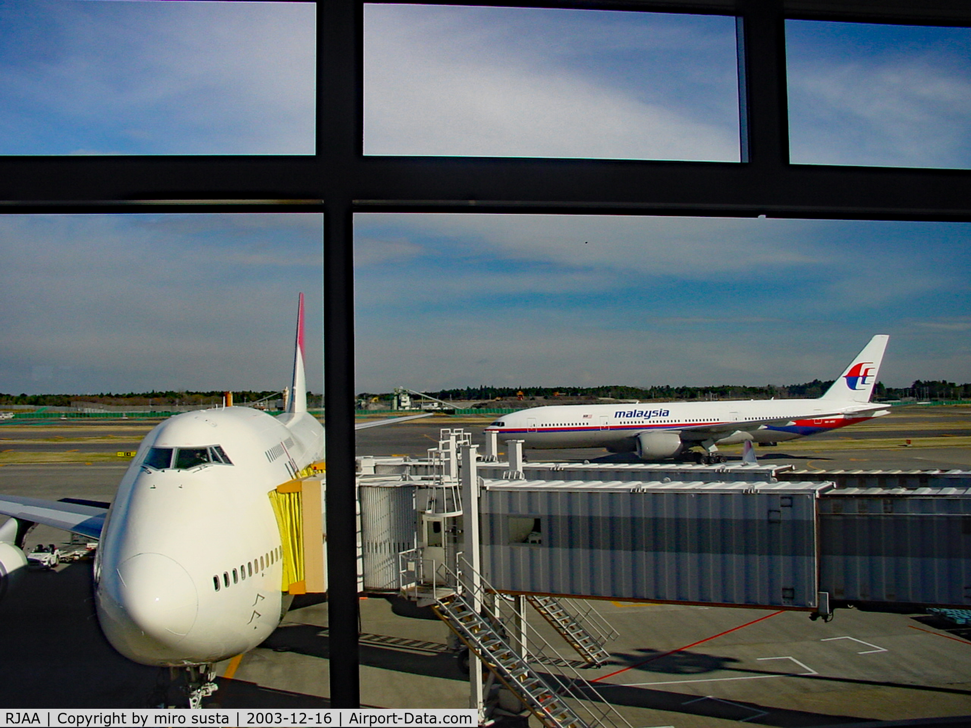 Narita International Airport (New Tokyo), Narita, Chiba Japan (RJAA) - Japan Air Boeing 747 at Tokyo-Narita Airport in 2003