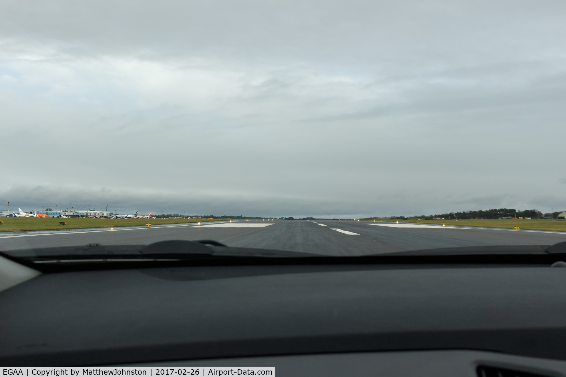 Belfast International Airport, Belfast, Northern Ireland United Kingdom (EGAA) - Driving along the runway at BFS