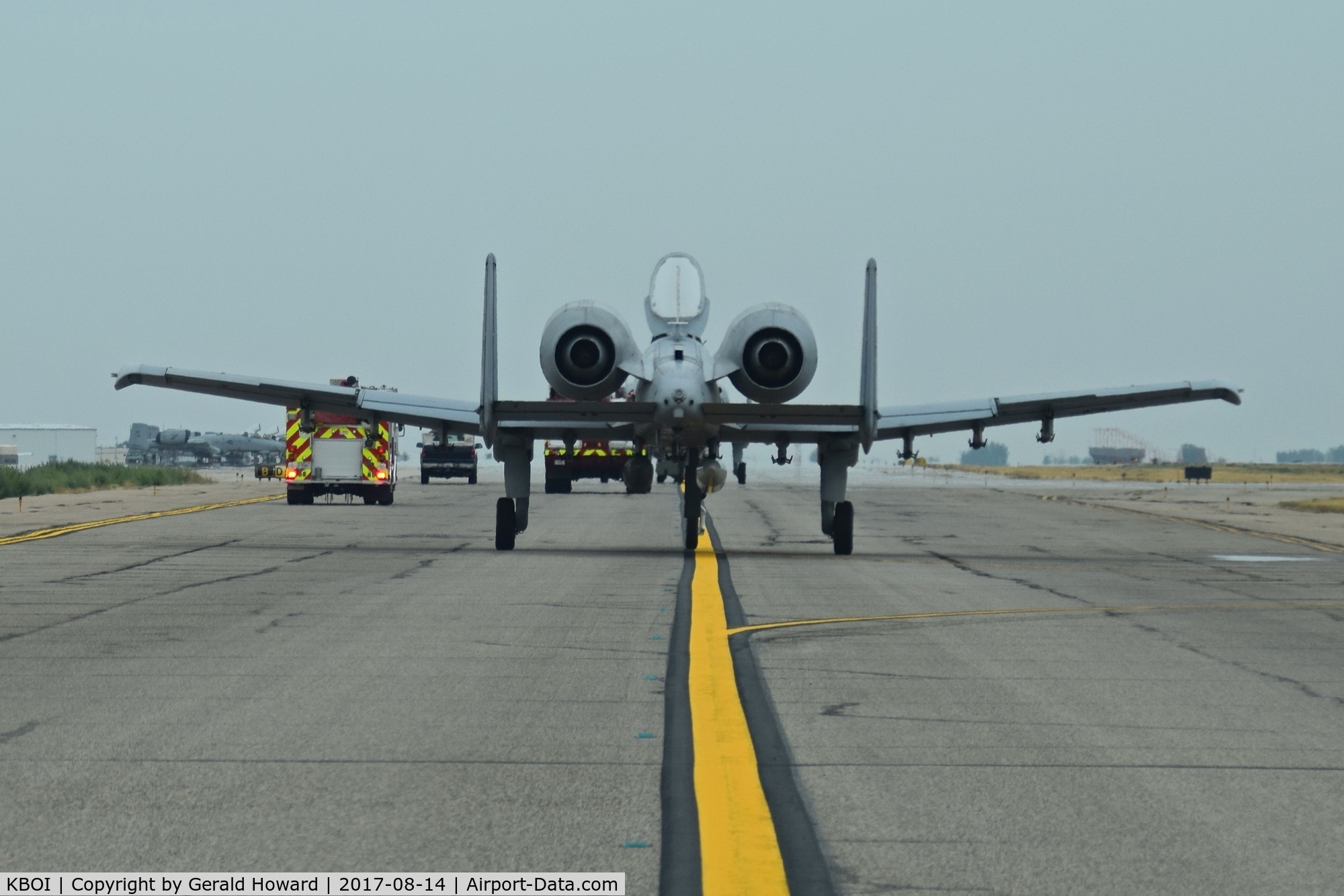 Boise Air Terminal/gowen Fld Airport (BOI) - Following A-10 & emergency equipment on Bravo to ANG ramp.