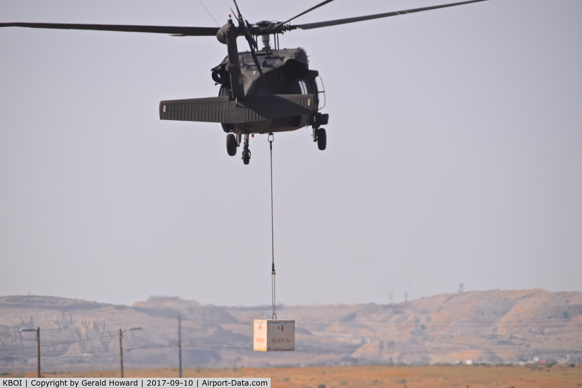 Boise Air Terminal/gowen Fld Airport (BOI) - UH-60L from the 1-183rd AVN BN, Idaho Army National Guard practicing some heavy lifting.
