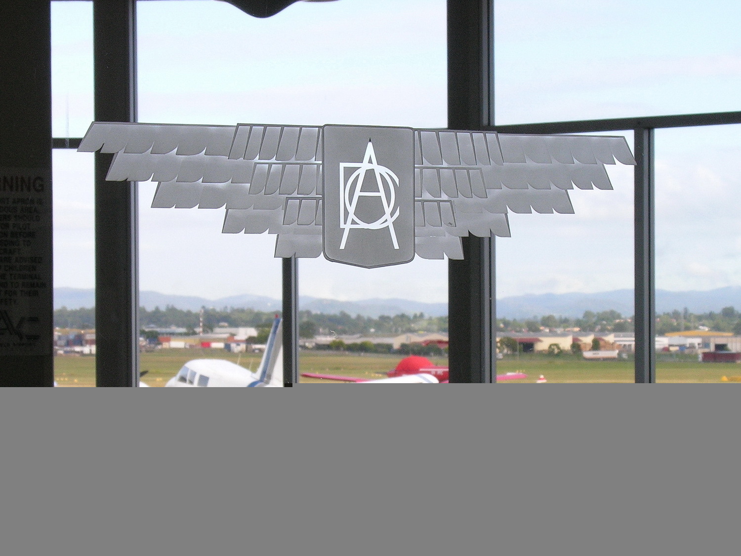 Archerfield Airport, Archerfield, Queensland Australia (YBAF) - DCA (Department of Civil Aviation) etched on the window of the waiting lounge - Archerfield Qld
