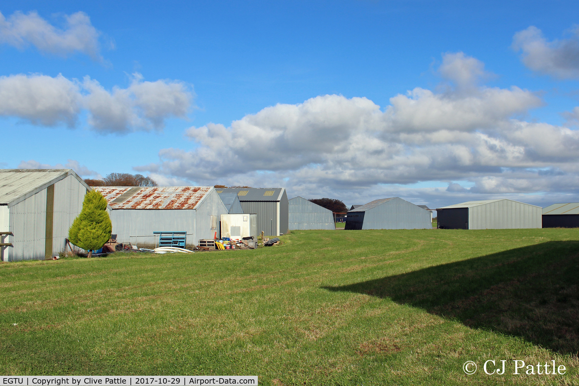 Dunkeswell Aerodrome Airport, Honiton, England United Kingdom (EGTU) - A section of the many hangars scattered about at Dunkeswell.