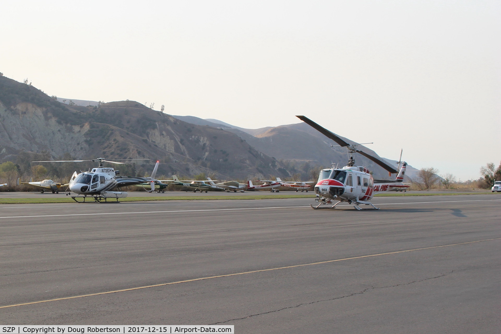 Santa Paula Airport (SZP) - Thomas Fire FireFighting helicopters at SZP Fire HeliBase. N718GH 2001 Eurocopter and CAL-FIRE 902 FireBombers at the ready-