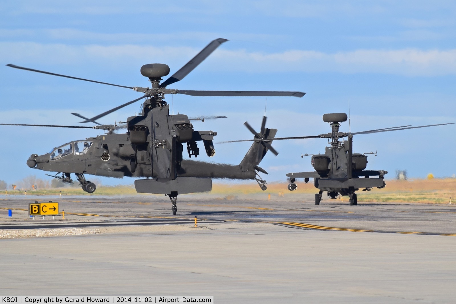 Boise Air Terminal/gowen Fld Airport (BOI) - AH-64s from the 1-183rd AVN BN, Idaho Army National Guard forming up on Taxiway Bravo.
