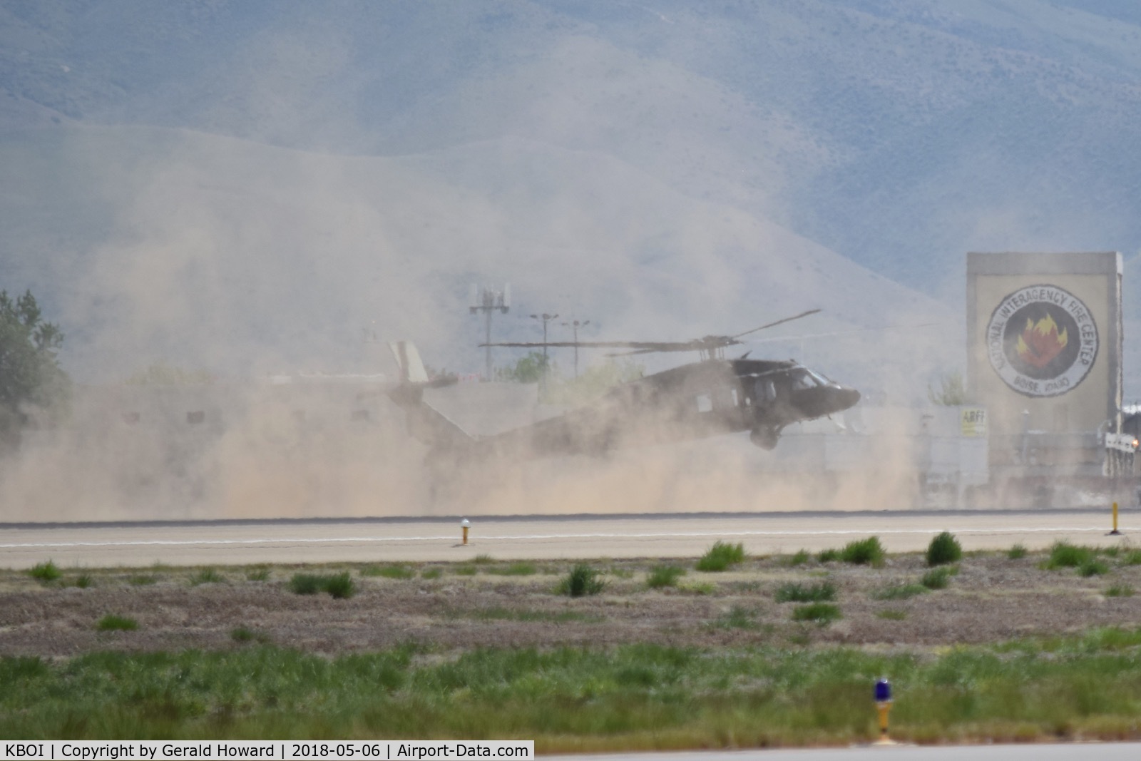 Boise Air Terminal/gowen Fld Airport (BOI) - UH-60L from the 1-183rd AVN BN, Idaho Army National Guard cleared to cross both runways. Apparently strayed from the taxiway.

