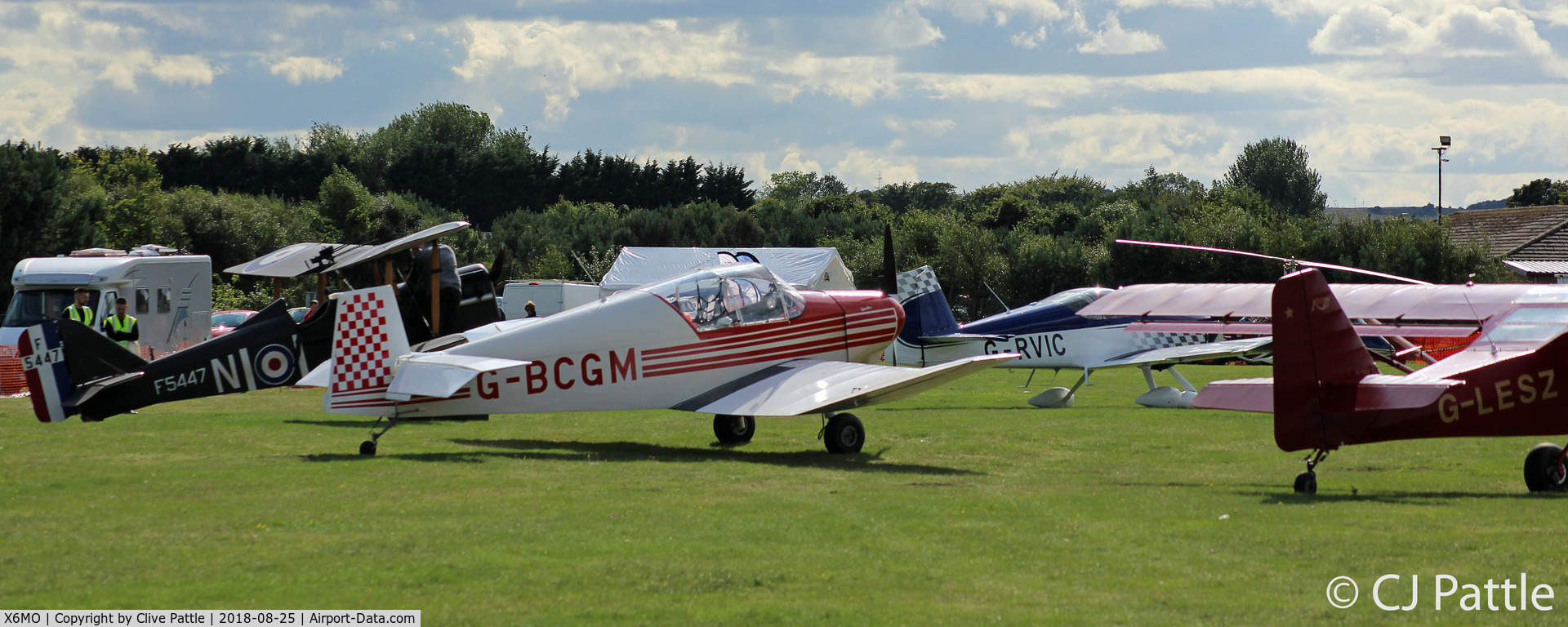 X6MO Airport - Aircraft line-up on the the site of the former RFC Station at Montrose, Angus, Scotland. The event was the Montrose Air Station Heritage Centre light aircraft fly-in held on 25th August 2018.