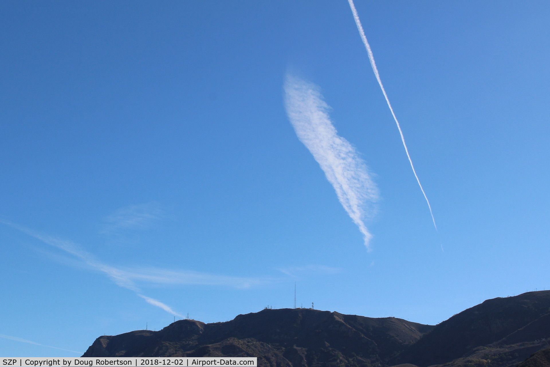 Santa Paula Airport (SZP) - Jet contrails over South Mountain of passenger jets enroute south-east bound to KLAX, Los Angeles International Airport