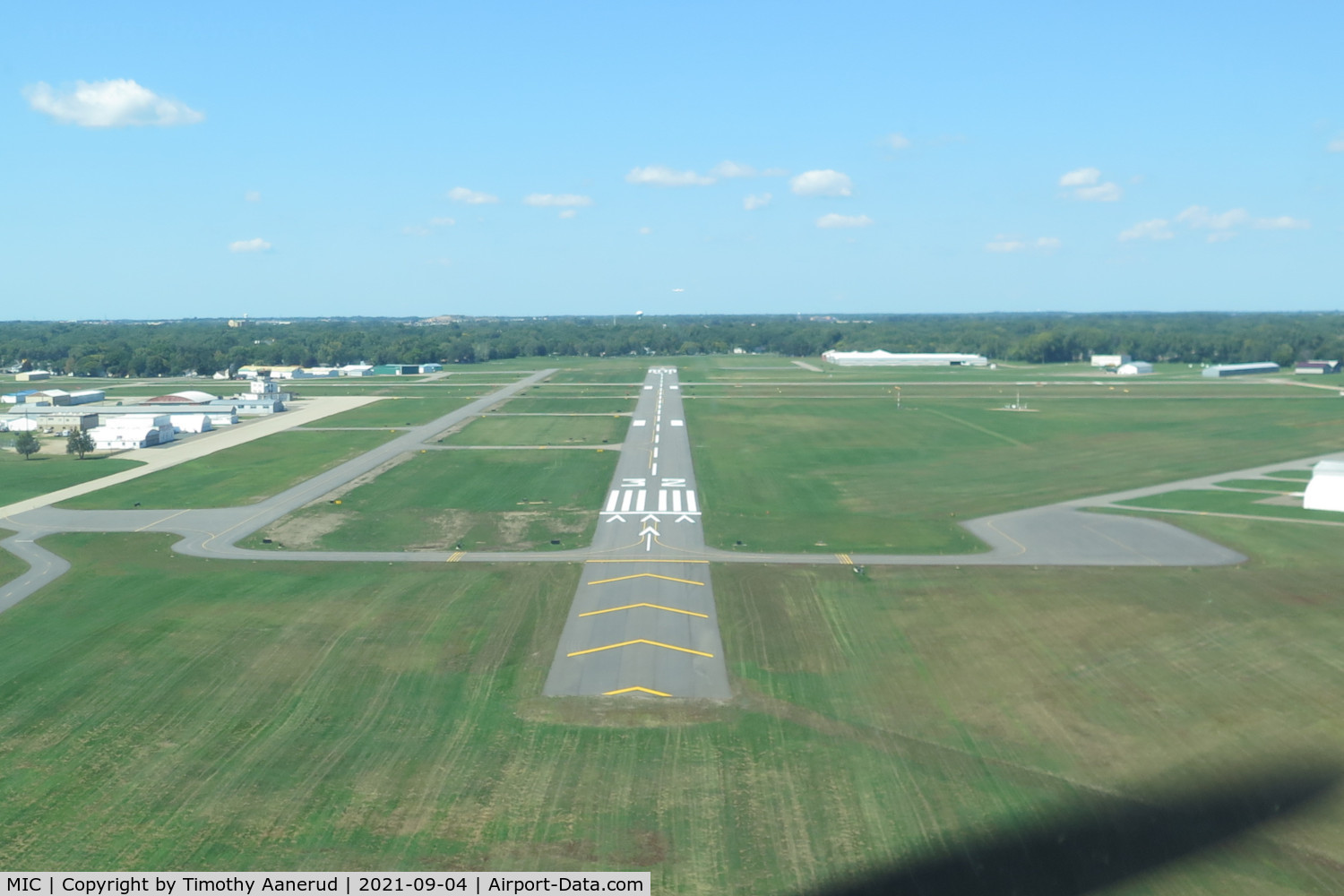 Crystal Airport (MIC) - Crystal airport, Minneapolis MN USA, short final Runway 32.  freshly painted runway stripes