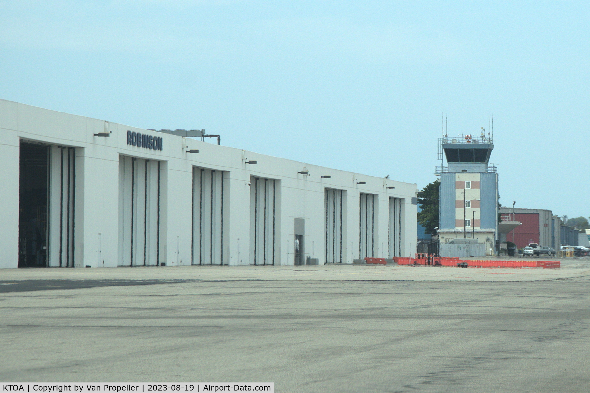 Zamperini Field Airport (TOA) - Torrance Zamperini Field: Robinson Helicopters (left) and control tower
