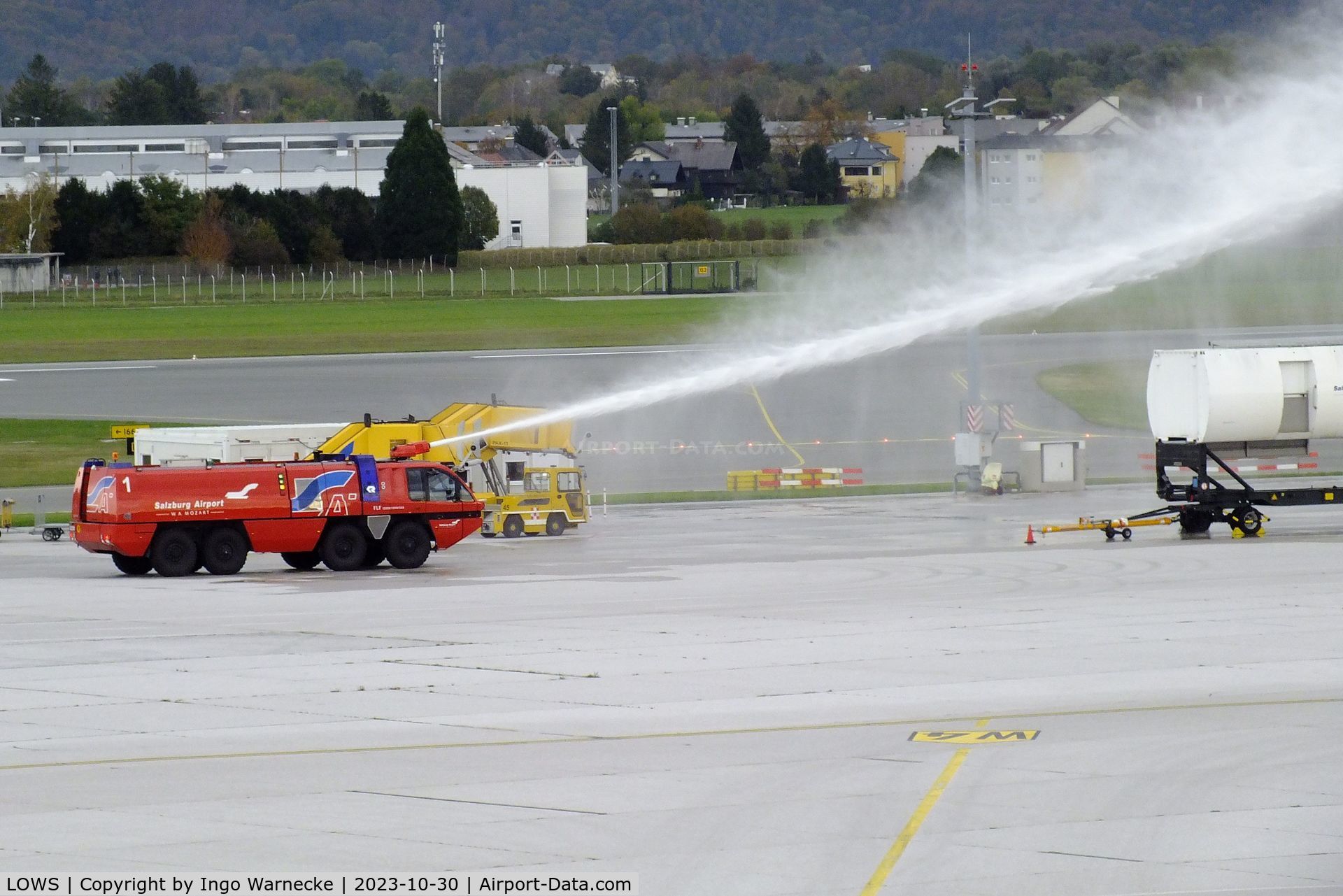 Salzburg Airport, Salzburg Austria (LOWS) - airport fire truck exercising with training trailer at Salzburg airport
