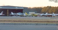 Hampton Roads Executive Airport (PVG) - A view of the parking apron at sunset - by Paul Perry