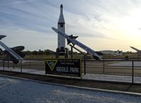 Point Mugu Nas (naval Base Ventura Co) Airport (NTD) - Missile Park, AGM-88 HARM Missile (as sign) foreground, and Main sign on Navalair Road-Naval Base Wood Road access turnoff from Pacific Coast Highway, Point Mugu, California. I managed HARM at Pt. Mugu-1983 to my 1995 retirement. - by Doug Robertson