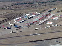 Pinal Airpark Airport (MZJ) - Some of the many airliners stored at MZJ - by John Meneely