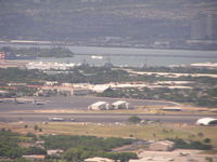 Honolulu International Airport, Honolulu, Hawaii United States (PHNL) - Hickam AFB ramp at Honolulu Intl Airport. Arizona Memorial in background. Taken on final to rnwy 8L - by John J. Boling