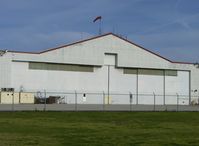 Camarillo Airport (CMA) - Ventura County Sheriff's Department Aviation Unit Hangar, windsock and ramp - by Doug Robertson