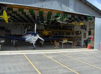Santa Paula Airport (SZP) - Aviation Museum of Santa Paula, Hangar #3, The Quinn Bucker Jungmann/Jungmeister Hangar. Aircraft will vary-Pat has owned 55! 2015 correction-56 aircraft owned! - by Doug Robertson