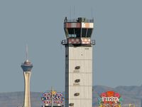 North Las Vegas Airport (VGT) - The 'old' ATCT with the Statosphere, Texas Station, and Fiesta Marquee's in background. - by Brad Campbell