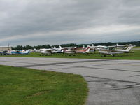 Frederick Municipal Airport (FDK) - These are the local planes.  The fly-in planes are way behind them. - by Sam Andrews