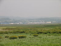 Williamsport Regional Airport (IPT) - Looking across the airport grounds from west to east.  Look closely and you can see a B-17 taxiing out for takeoff. - by Sam Andrews