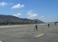 Santa Paula Airport (SZP) - Tandem liftoff N89014 SNJ-5 & N8540P AT-6D, Runway 22, (just 60' wide) - by Doug Robertson