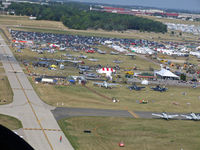 Wittman Regional Airport (OSH) - As far as you could see-airplanes, people, neat stuff! - by Jim Uber
